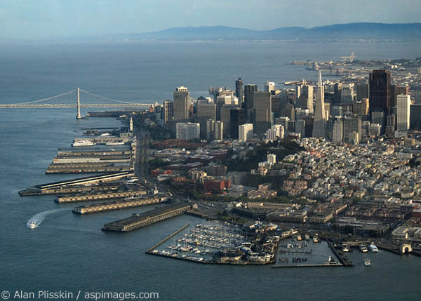 An aerial view of downtown San Francisco, the waterfront and the Oakland Bay Bridge.