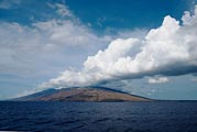 On a whale watching tour, this cloud formation was streaming off of Maui.