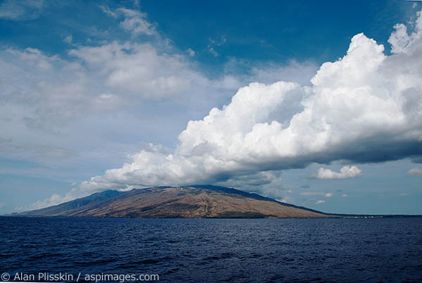 On a whale watching tour, this cloud formation was streaming off of Maui.