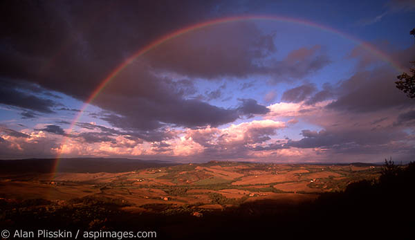 I got up early to photograph the sunrise near a hilltop town where we were staying and was initially disappointed because it was heavily overcast. After waiting an hour or so the sky started clearing and I was rewarded with this full rainbow.