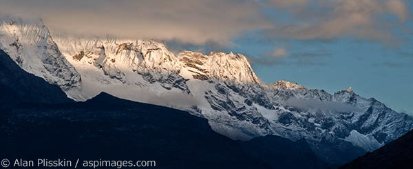 While waiting for the clouds to break near Everest, I turned around to see this mountain range lit up in the morning light.