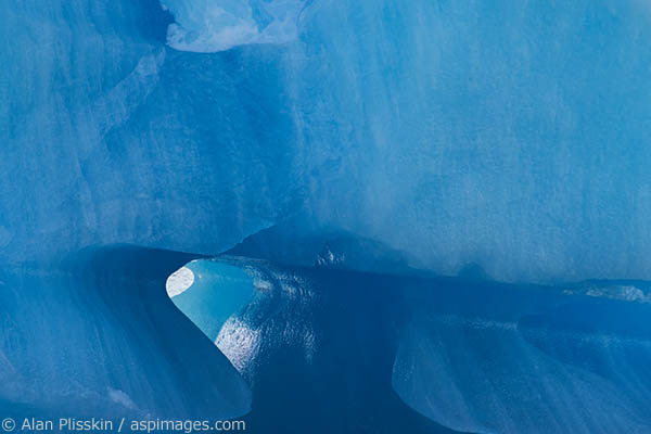 This iceberg was on the way to the Viedma Glacier.  There was a hole that had been eaten through by the lake water and made for an interesting visual.