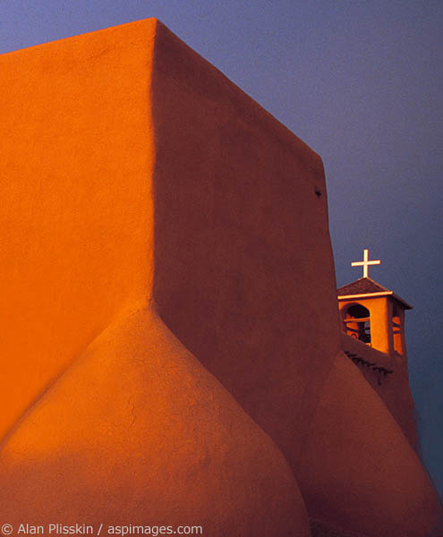 Setting sunlight illuminates this church made famous by Ansel Adams.